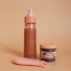 Biberon Mágico y Tiny Potito Chocolate con cuchara para muñecos · Tiny Harlow